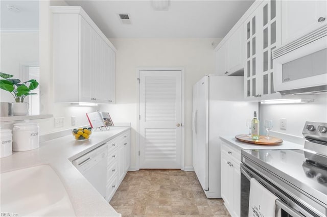 2819 Rose Garden Way, Virginia Beach, VA 23456 - kitchen with white appliances, white cabinets, light countertops, and a sink