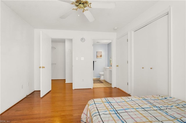 303 Settlement Dr Unit 303, Williamsburg, VA 23188 - unfurnished bedroom with light wood-style floors, a closet, ceiling fan, and ensuite bath