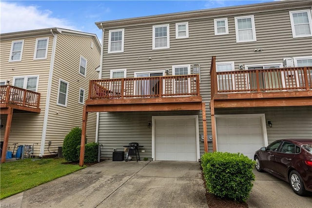 249 Carnelian St Unit 85A, Virginia Beach, VA 23462 - back of property featuring an attached garage and driveway