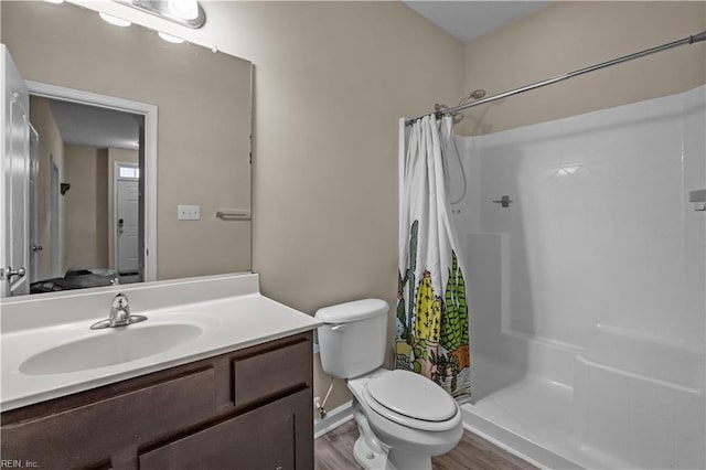 249 Carnelian St Unit 85A, Virginia Beach, VA 23462 - bathroom with vanity, a shower with curtain, toilet, and wood finished floors