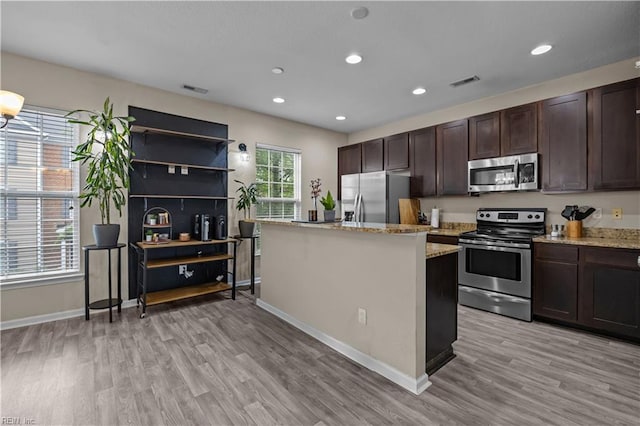 249 Carnelian St Unit 85A, Virginia Beach, VA 23462 - kitchen featuring appliances with stainless steel finishes, light wood-style flooring, baseboards, dark brown cabinets, and recessed lighting