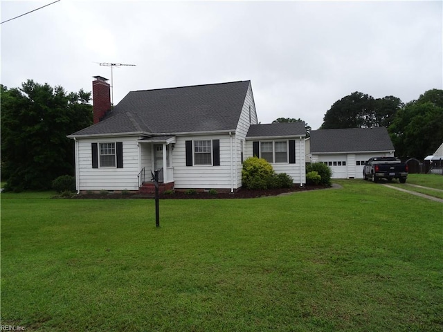101 Lumar Rd, Smithfield, VA 23430 - new england style home with a chimney, a front lawn, and a garage