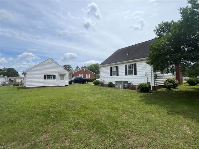 101 Lumar Rd, Smithfield, VA 23430 - back of property featuring central AC unit and a lawn
