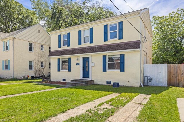 127 Clyde St, Hampton, VA 23669 - view of front facade featuring brick siding and a shingled roof