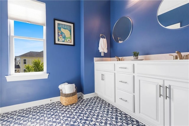 531 Middleton Way, Chesapeake, VA 23322 - bathroom with baseboards, double vanity, and tile patterned flooring