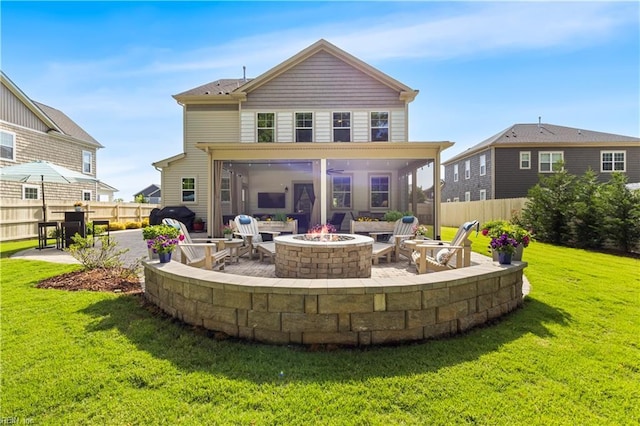 531 Middleton Way, Chesapeake, VA 23322 - rear view of house featuring a fire pit, a patio, and a sunroom