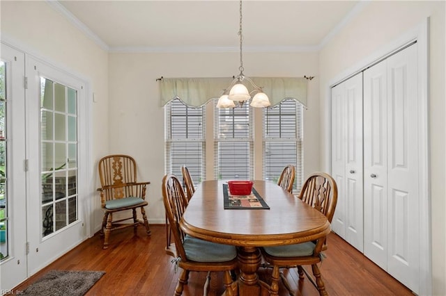 313 Preservation Reach Reach, Chesapeake, VA 23320 - dining area featuring wood finished floors, ornamental molding, and a chandelier