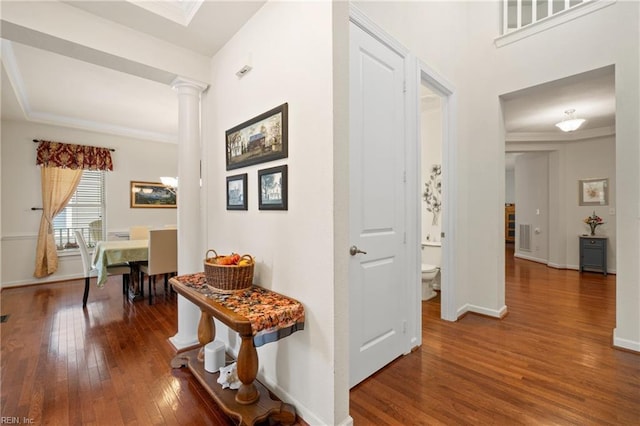 313 Preservation Reach Reach, Chesapeake, VA 23320 - hall featuring wood-type flooring, baseboards, ornate columns, and ornamental molding
