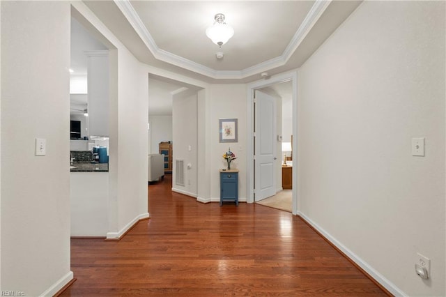 313 Preservation Reach Reach, Chesapeake, VA 23320 - corridor featuring wood finished floors, a raised ceiling, ornamental molding, and baseboards