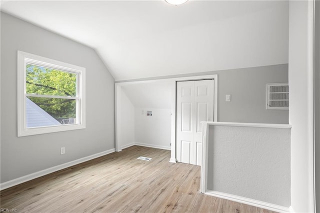 31 W Sunset Rd, Hampton, VA 23669 - bonus room with light wood-style flooring, lofted ceiling, and baseboards