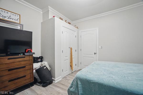 1918 Prentis Ave, Portsmouth, VA 23704 - bedroom featuring ornamental molding, light wood-style flooring, and baseboards