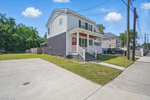 1918 Prentis Ave, Portsmouth, VA 23704 - view of front facade featuring a porch and a front yard