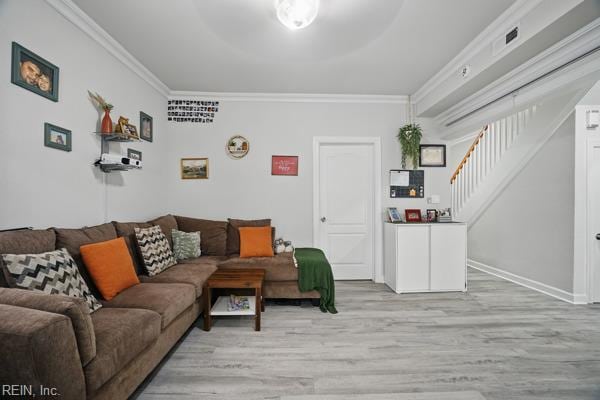 1918 Prentis Ave, Portsmouth, VA 23704 - living room featuring light wood-style flooring, ornamental molding, stairway, and baseboards