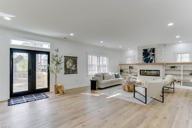 2417 Cedar Rd, Chesapeake, VA 23323 - living area featuring french doors, light wood-style flooring, crown molding, recessed lighting, and baseboards