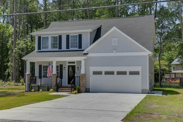 2417 Cedar Rd, Chesapeake, VA 23323 - view of front of house featuring a porch, a front yard, concrete driveway, and an attached garage