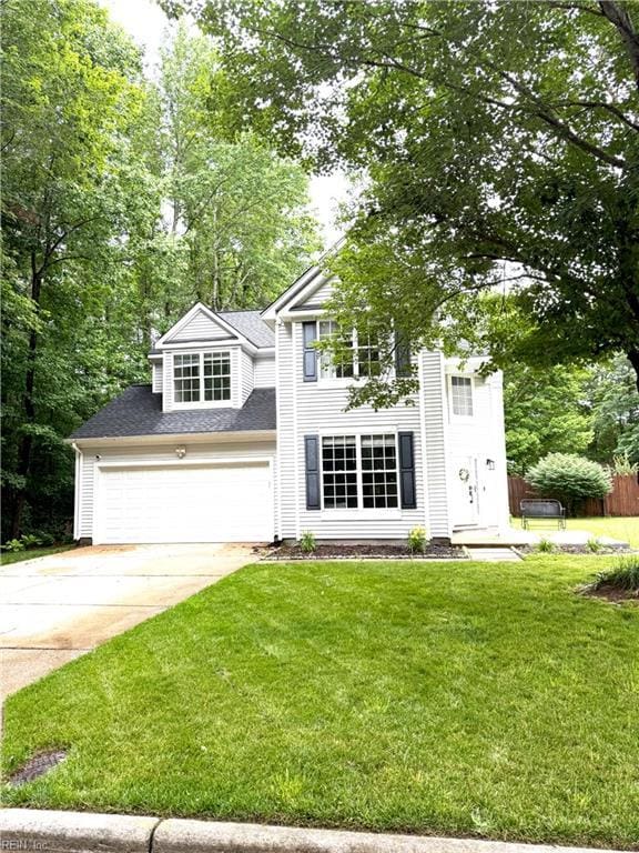 2141 Sunset Maple Ln, Chesapeake, VA 23323 - traditional-style home with driveway, a shingled roof, and a garage
