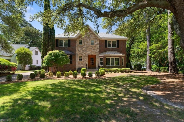 511 Brackenridge Ave, Norfolk, VA 23505 - traditional-style home featuring stone siding and a front yard