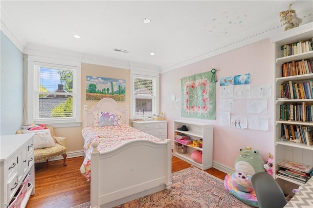 511 Brackenridge Ave, Norfolk, VA 23505 - bedroom with ornamental molding, light wood finished floors, multiple windows, and baseboards