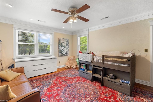 511 Brackenridge Ave, Norfolk, VA 23505 - bedroom with crown molding, wood finished floors, baseboards, and ceiling fan