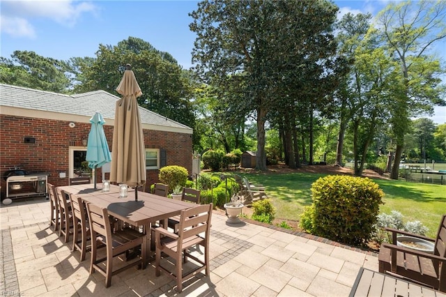 511 Brackenridge Ave, Norfolk, VA 23505 - view of patio / terrace featuring outdoor dining area and view of wooded area