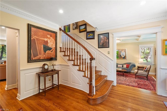 511 Brackenridge Ave, Norfolk, VA 23505 - stairway featuring ornamental molding, wood finished floors, recessed lighting, a decorative wall, and wainscoting