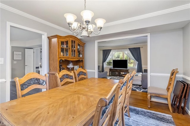 8 Assembly Ct, Newport News, VA 23606 - dining room with a chandelier, wood finished floors, and ornamental molding