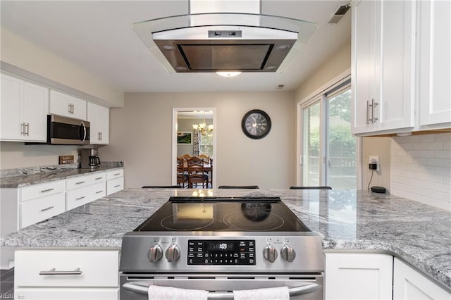 8 Assembly Ct, Newport News, VA 23606 - kitchen featuring stainless steel appliances, ventilation hood, white cabinetry, a chandelier, and light stone counters