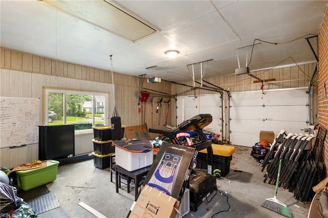 8 Assembly Ct, Newport News, VA 23606 - garage with a garage door opener and wood walls