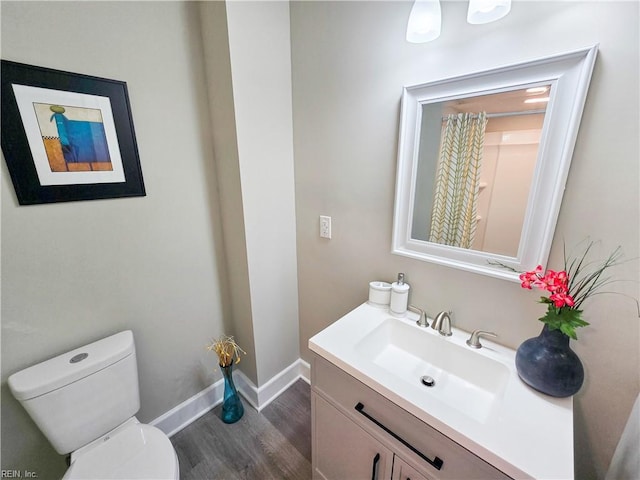 1251 Little Bay Ave, Norfolk, VA 23503 - full bath with wood finished floors, vanity, toilet, and baseboards