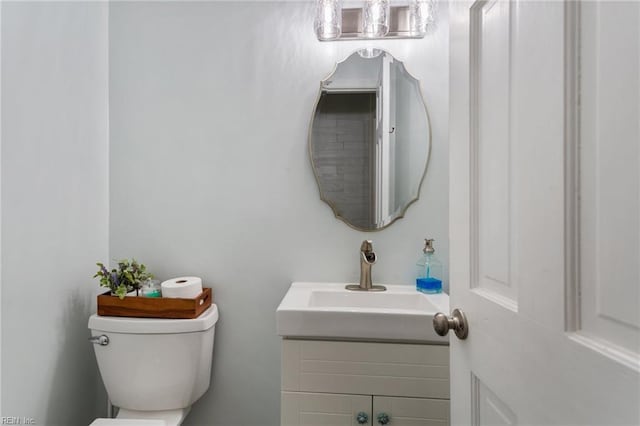 5801 Lancelot Dr, Virginia Beach, VA 23464 - half bathroom featuring toilet and vanity