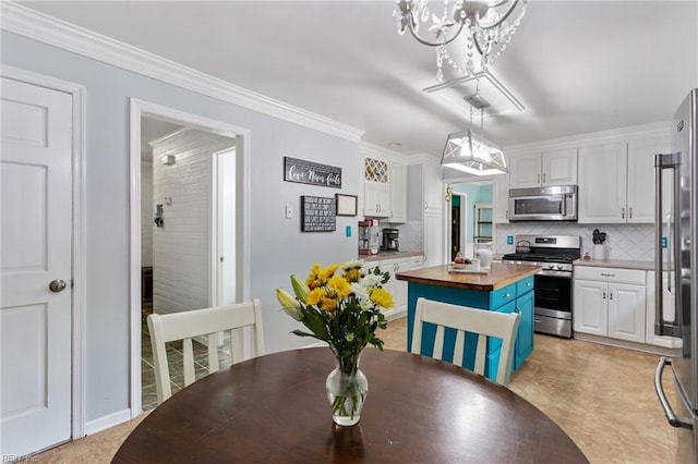 5801 Lancelot Dr, Virginia Beach, VA 23464 - dining space with a chandelier and crown molding