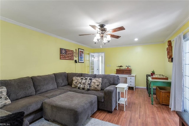 5801 Lancelot Dr, Virginia Beach, VA 23464 - living area featuring wood finished floors, crown molding, ceiling fan, and baseboards
