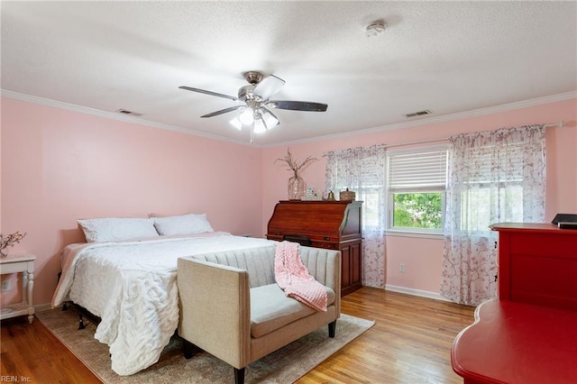 5801 Lancelot Dr, Virginia Beach, VA 23464 - bedroom with light wood finished floors, baseboards, crown molding, and a ceiling fan