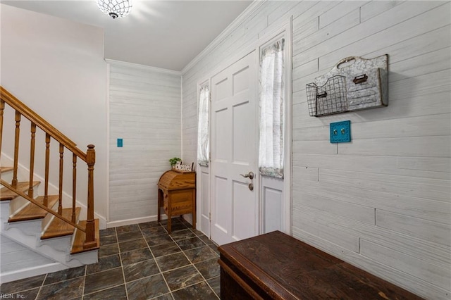 5801 Lancelot Dr, Virginia Beach, VA 23464 - foyer with ornamental molding, stairway, wooden walls, baseboards, and stone finish flooring