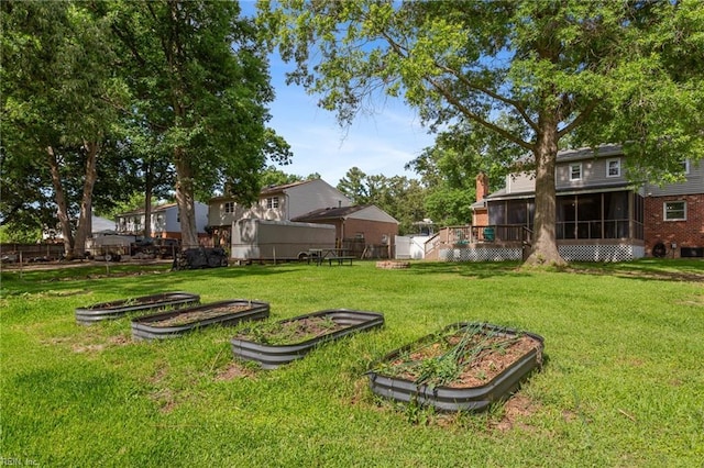5801 Lancelot Dr, Virginia Beach, VA 23464 - view of yard with a sunroom and a vegetable garden
