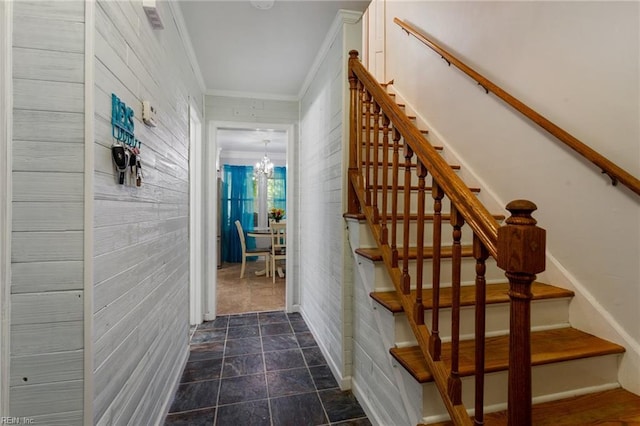 5801 Lancelot Dr, Virginia Beach, VA 23464 - stairway with ornamental molding, a chandelier, stone finish floors, and baseboards