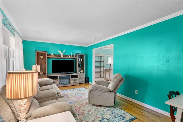 5801 Lancelot Dr, Virginia Beach, VA 23464 - living area with wood finished floors, ornamental molding, and baseboards