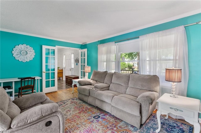 5801 Lancelot Dr, Virginia Beach, VA 23464 - living area with french doors, crown molding, and wood finished floors