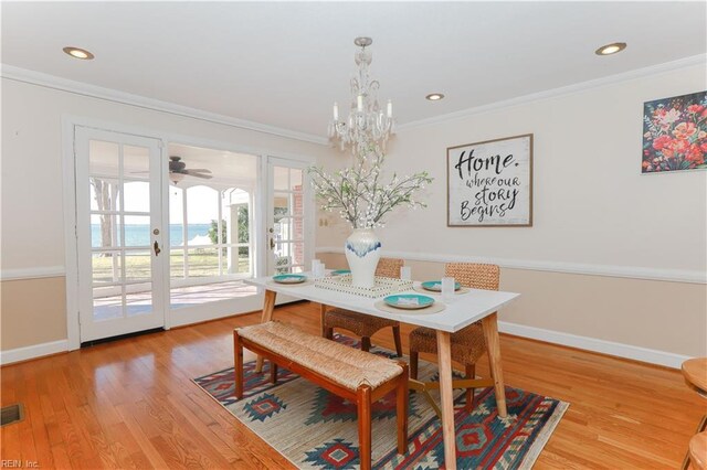 609 River Rd, Newport News, VA 23601 - dining area with ornamental molding, recessed lighting, light wood-style floors, baseboards, and a chandelier