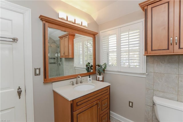 609 River Rd, Newport News, VA 23601 - bathroom with vanity, toilet, and lofted ceiling