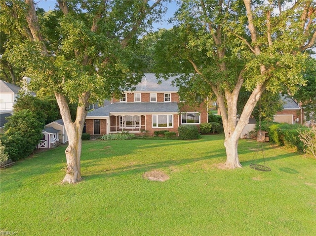 609 River Rd, Newport News, VA 23601 - view of front of property featuring brick siding and a front lawn