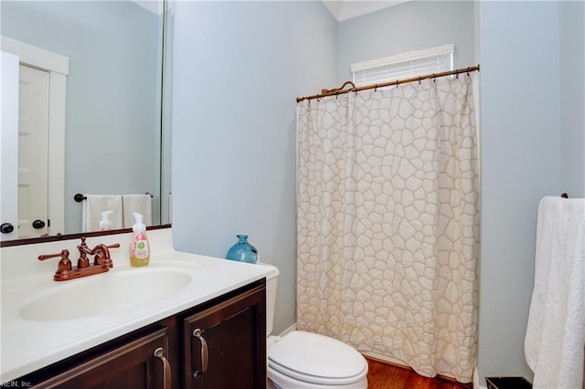 3304 Dodd Dr, Chesapeake, VA 23323 - bathroom featuring vanity, toilet, a shower with curtain, and wood finished floors