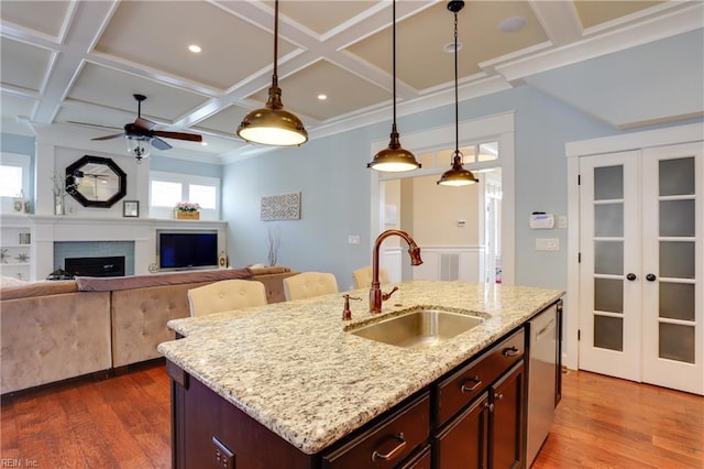 3304 Dodd Dr, Chesapeake, VA 23323 - kitchen featuring a sink, ceiling fan, coffered ceiling, dark wood-style flooring, and hanging light fixtures