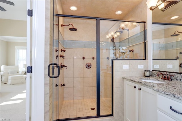 3304 Dodd Dr, Chesapeake, VA 23323 - bathroom featuring vanity, a stall shower, and recessed lighting