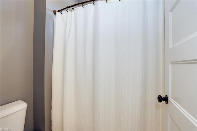 3304 Dodd Dr, Chesapeake, VA 23323 - bathroom with toilet and a shower with shower curtain