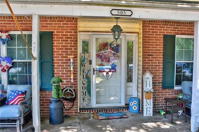 505 Stockton St, Hampton, VA 23669 - doorway to property featuring brick siding