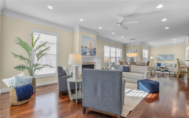 3964 W Stratford Rd, Virginia Beach, VA 23455 - living room featuring crown molding, hardwood / wood-style flooring, ceiling fan, a fireplace, and baseboards