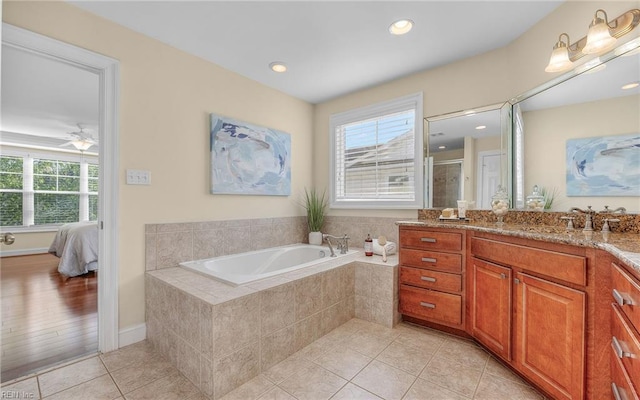 3964 W Stratford Rd, Virginia Beach, VA 23455 - full bathroom with a bath, vanity, tile patterned floors, a stall shower, and ensuite bathroom