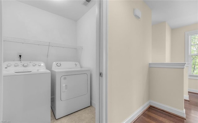 3964 W Stratford Rd, Virginia Beach, VA 23455 - laundry area featuring washing machine and clothes dryer and baseboards