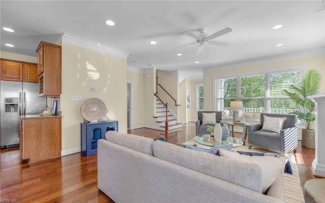 3964 W Stratford Rd, Virginia Beach, VA 23455 - living area with crown molding, stairway, recessed lighting, ceiling fan, and wood finished floors
